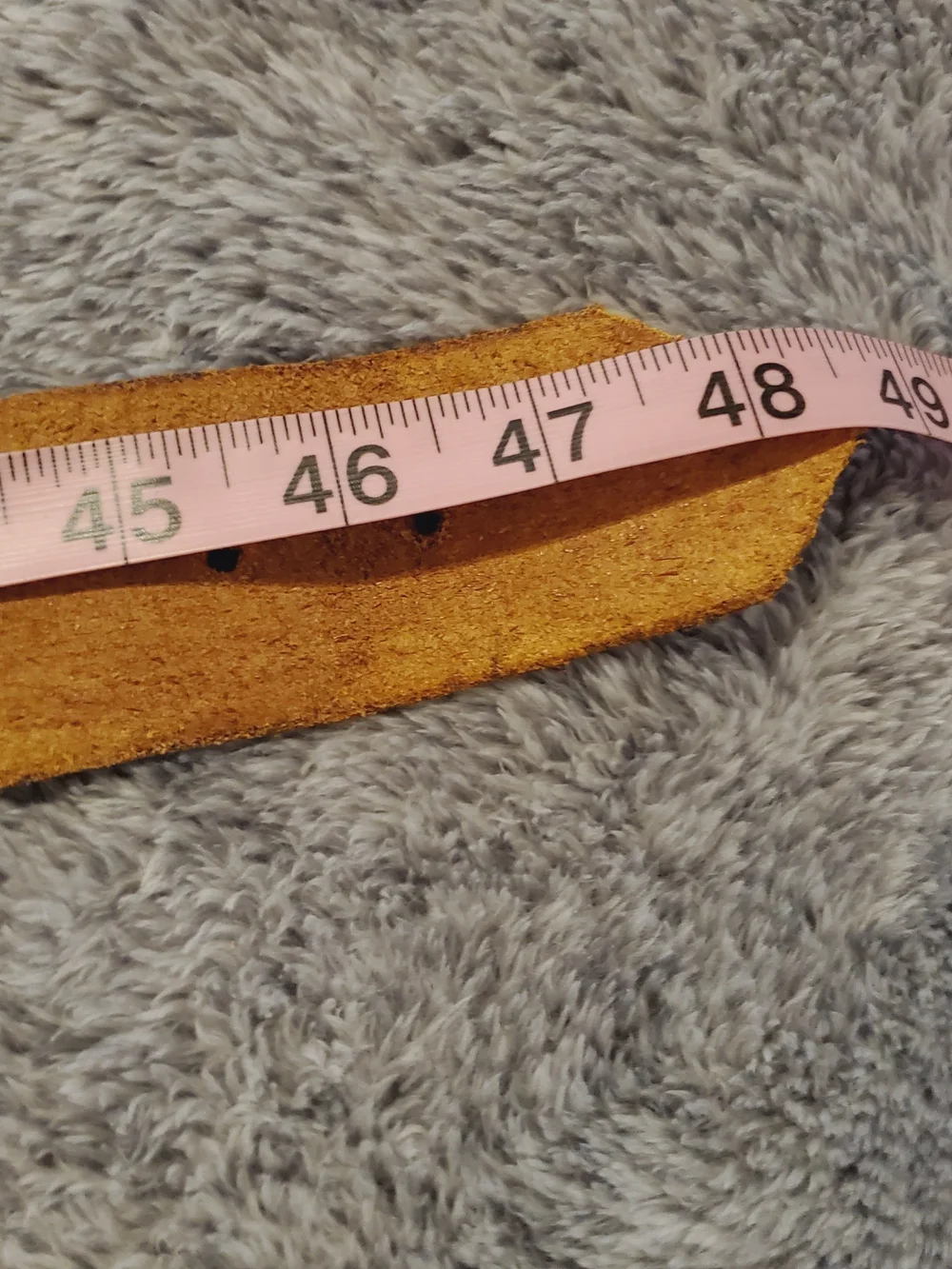 Vintage hand-tooled leather belt features a distinctive Viking Valknut symbo